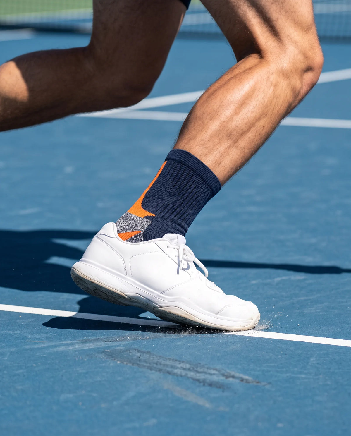 Court Crew in a hard-court slide
