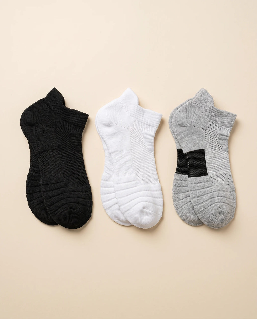 Black, white and gray pairs laid flat side by side