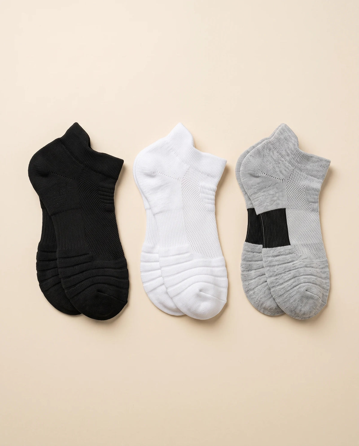 Black, white and gray pairs laid flat side by side